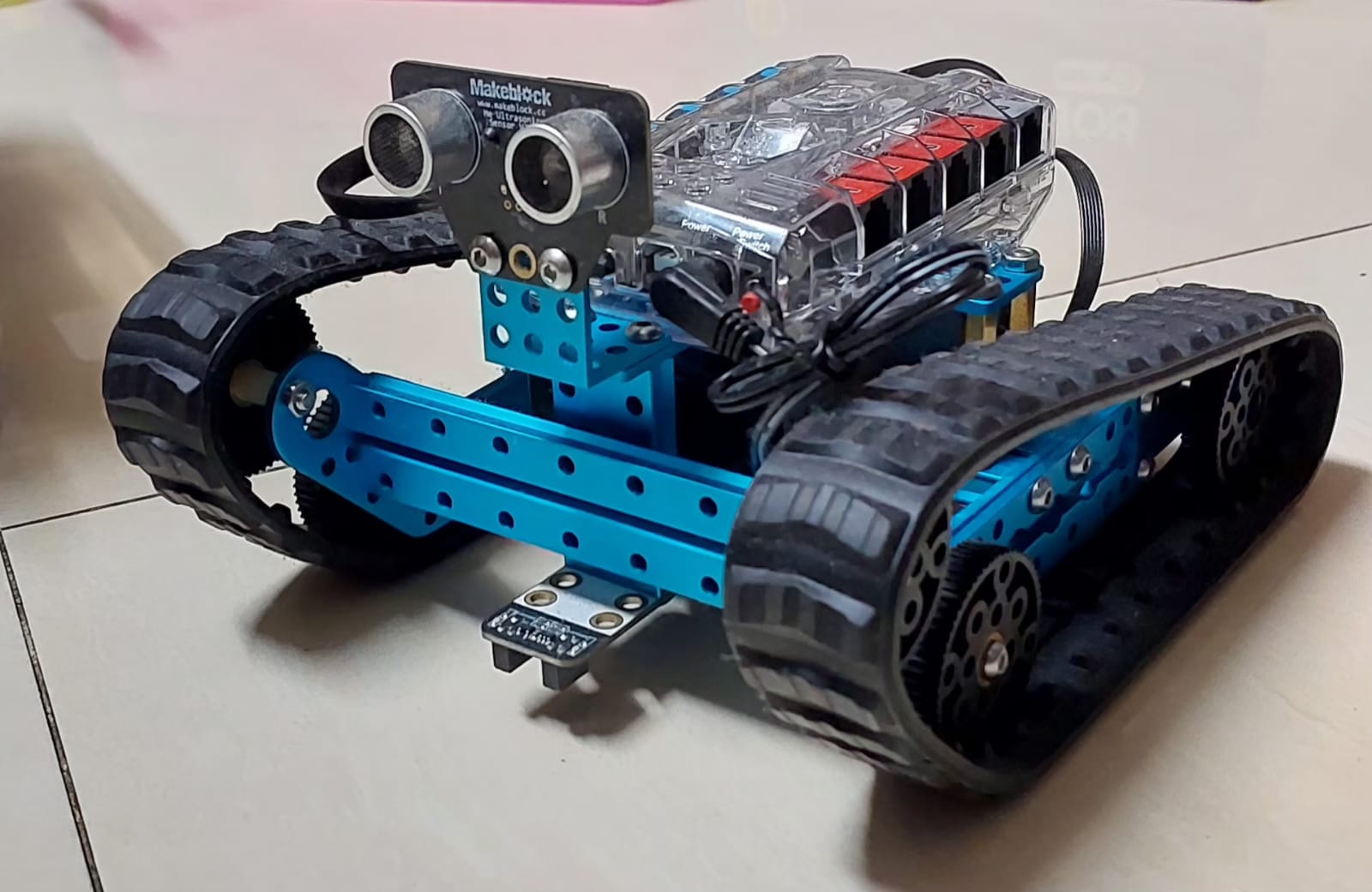 Ultrasonic sensor 'eyes' scan ahead so Ranger can dodge obstacles on its own.